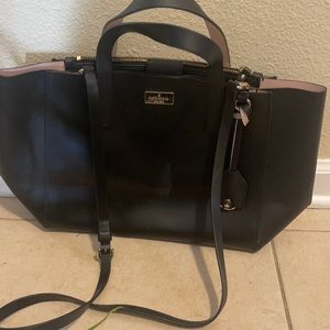 Beautiful used a few times black Kate spade bag! Blush color inside